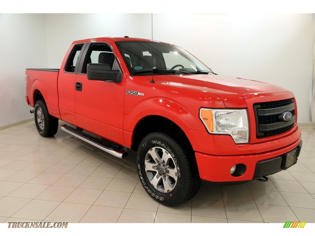 Race Red / Steel Gray Ford F150 STX SuperCab 4x4