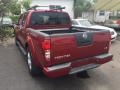 Nissan Frontier LE Crew Cab Red Brawn photo #3
