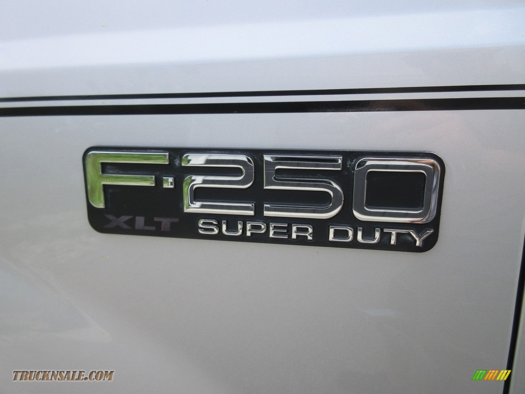 2001 F250 Super Duty XLT SuperCab 4x4 - Silver Metallic / Medium Graphite photo #14