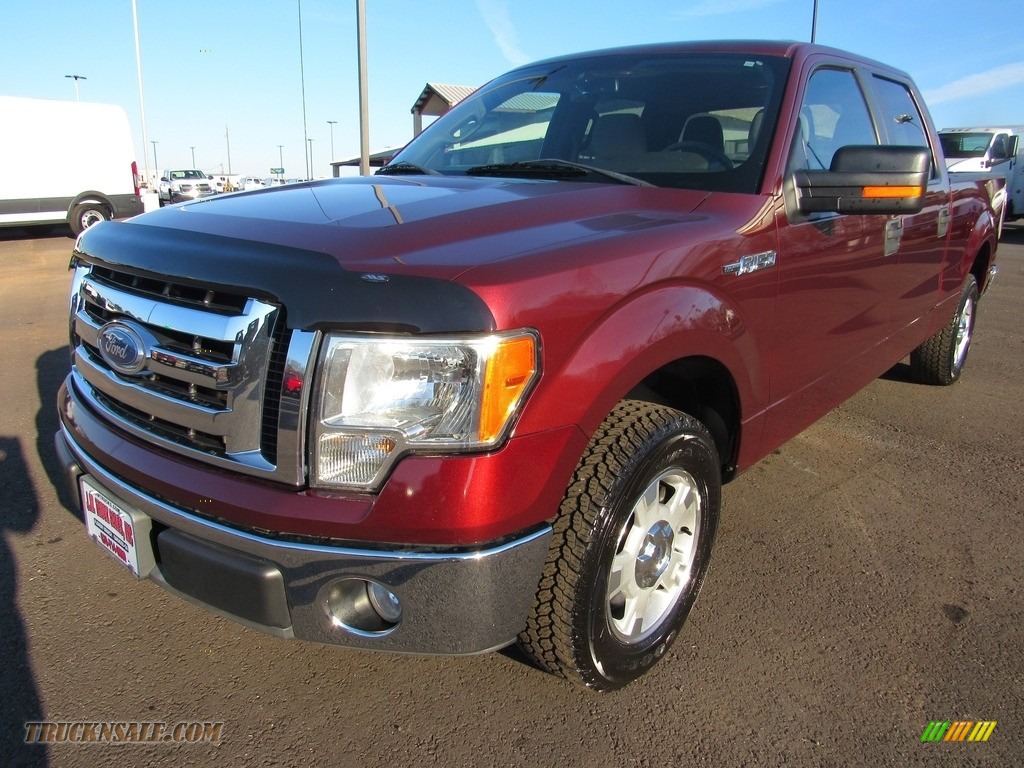 Red Candy Metallic / Tan Ford F150 XLT SuperCrew