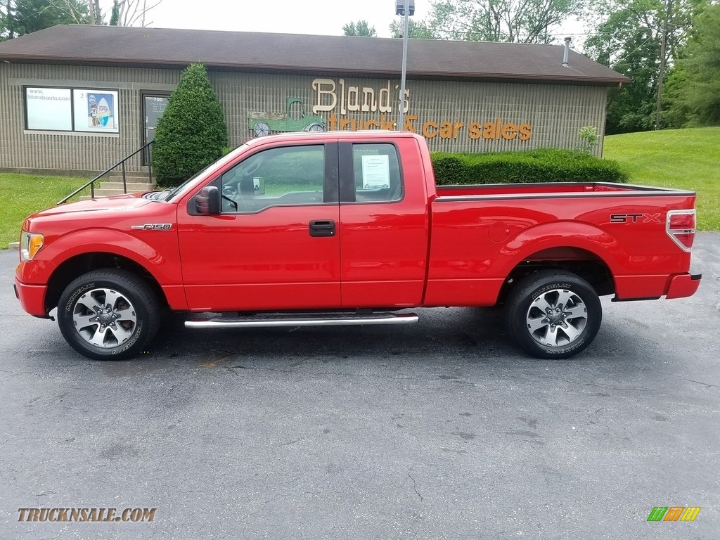 Race Red / Steel Gray Ford F150 STX SuperCab
