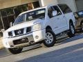 Nissan Titan LE Crew Cab 4x4 White photo #1